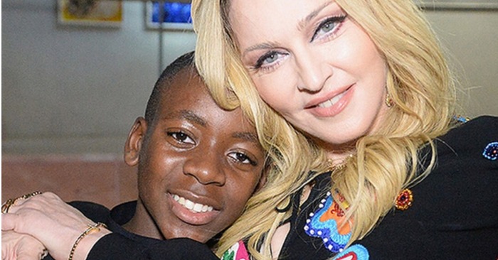  Madonna’s 16-year-old son surprised everyone: he appeared in public in a red dress with a neckline