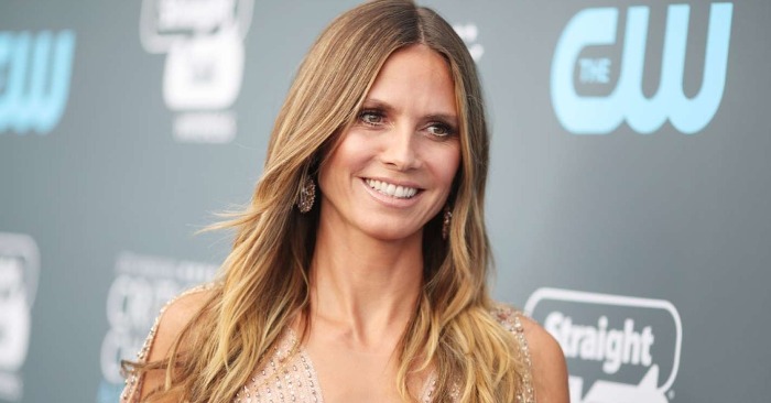  «Like a butterfly on high heels!» Mom of four Heidi Klum left little to the imagination at the premiere